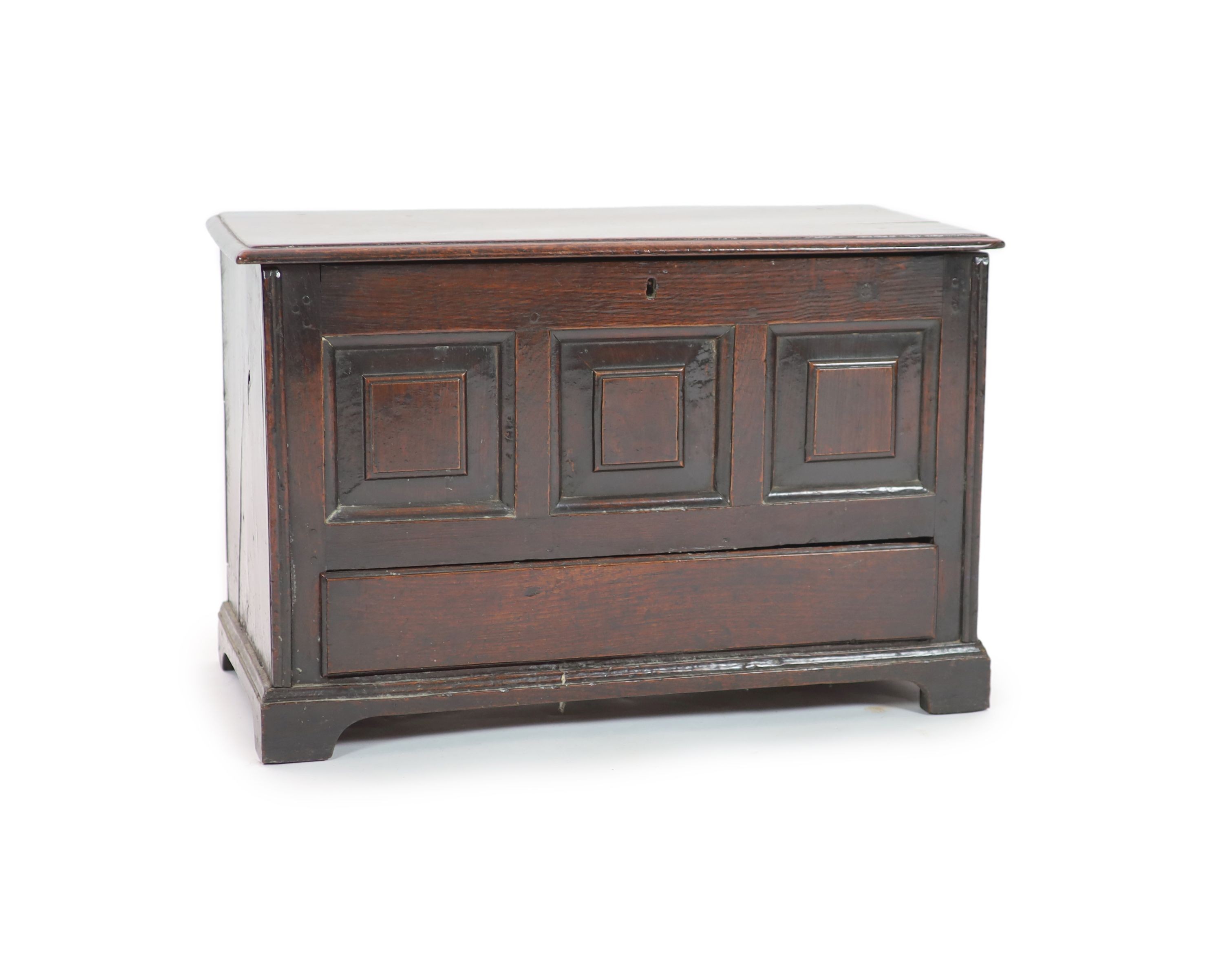An 18th century Welsh oak coffer bach, H 39cm. W 61cm. D 29cm.